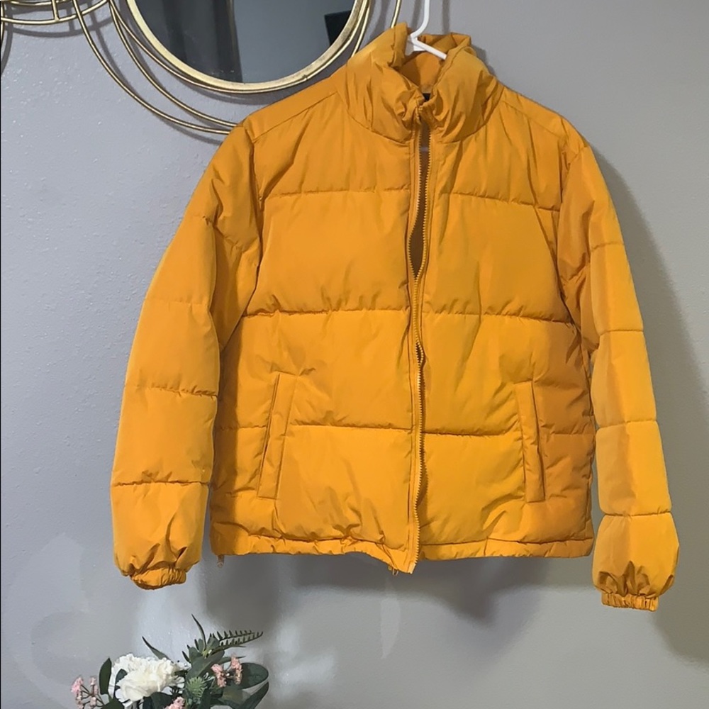yellow puffer jacket